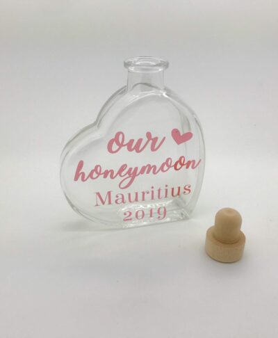 honeymoon sand heart with dates on