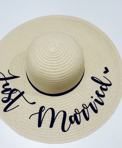 Natural wide brimmed sun hat with black “Just Married” script – perfect honeymoon and bride to be accessory.